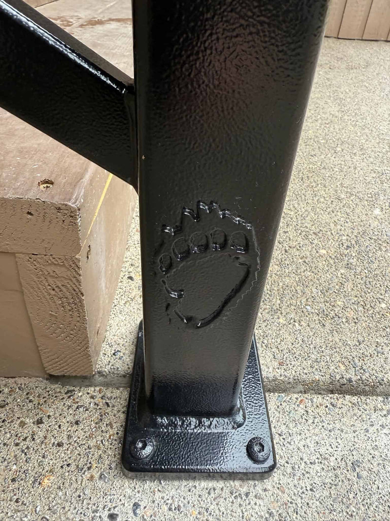 Hand Rail installed on front of home with custom Bear Paw welded on.