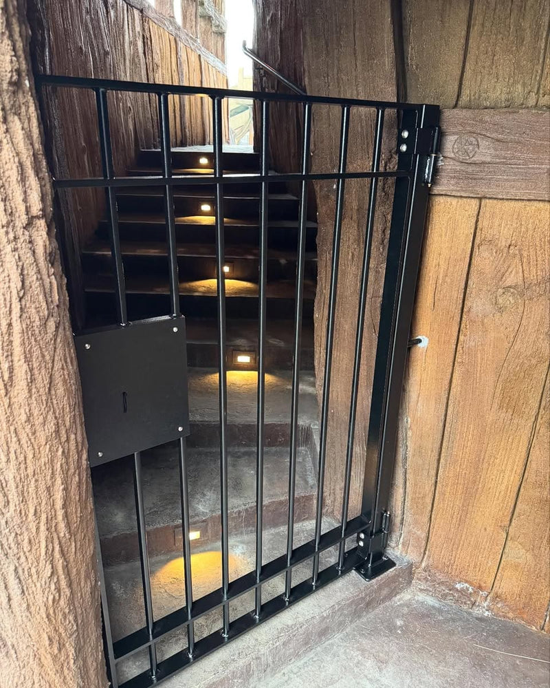 Black Metal gate with old fashion key and lock