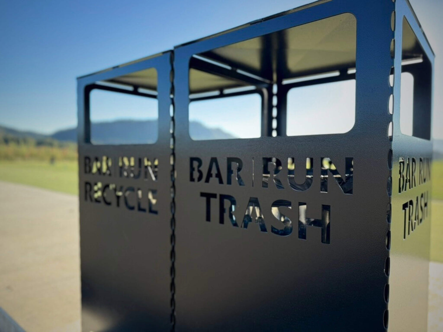 Custom Commercial metal trash and recycling can. 30 gallon on a golf course. 