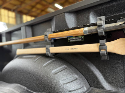 Fire tools held in place with quick release tool mount in the back of a ford king ranch truck.